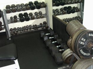 Fitness weights located in the Hughes Community Center weight room